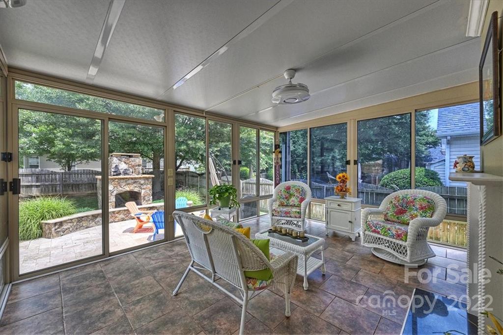 728 Beille Lane Fort Mill, SC 29708 - Photo 24 of 48 a living room with furniture and a floor to ceiling window