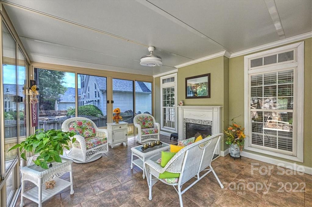 728 Beille Lane Fort Mill, SC 29708 - Photo 25 of 48 a living room with furniture fireplace and a large window