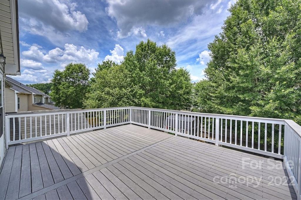 728 Beille Lane Fort Mill, SC 29708 - Photo 38 of 48 a view of backyard with deck and wooden floor