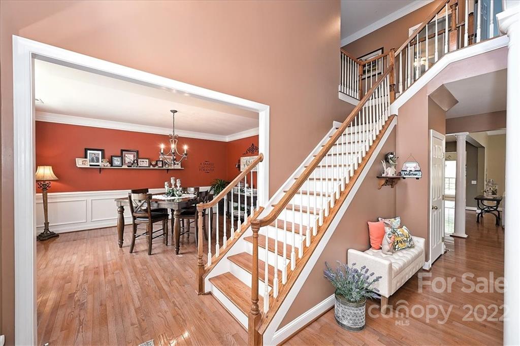 728 Beille Lane Fort Mill, SC 29708 - Photo 6 of 48 a dining room with furniture entryway and wooden floor