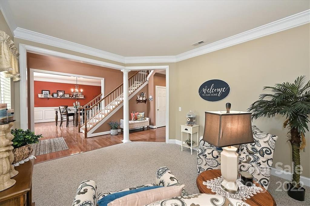 728 Beille Lane Fort Mill, SC 29708 - Photo 8 of 48 a living room with furniture and a wooden floor