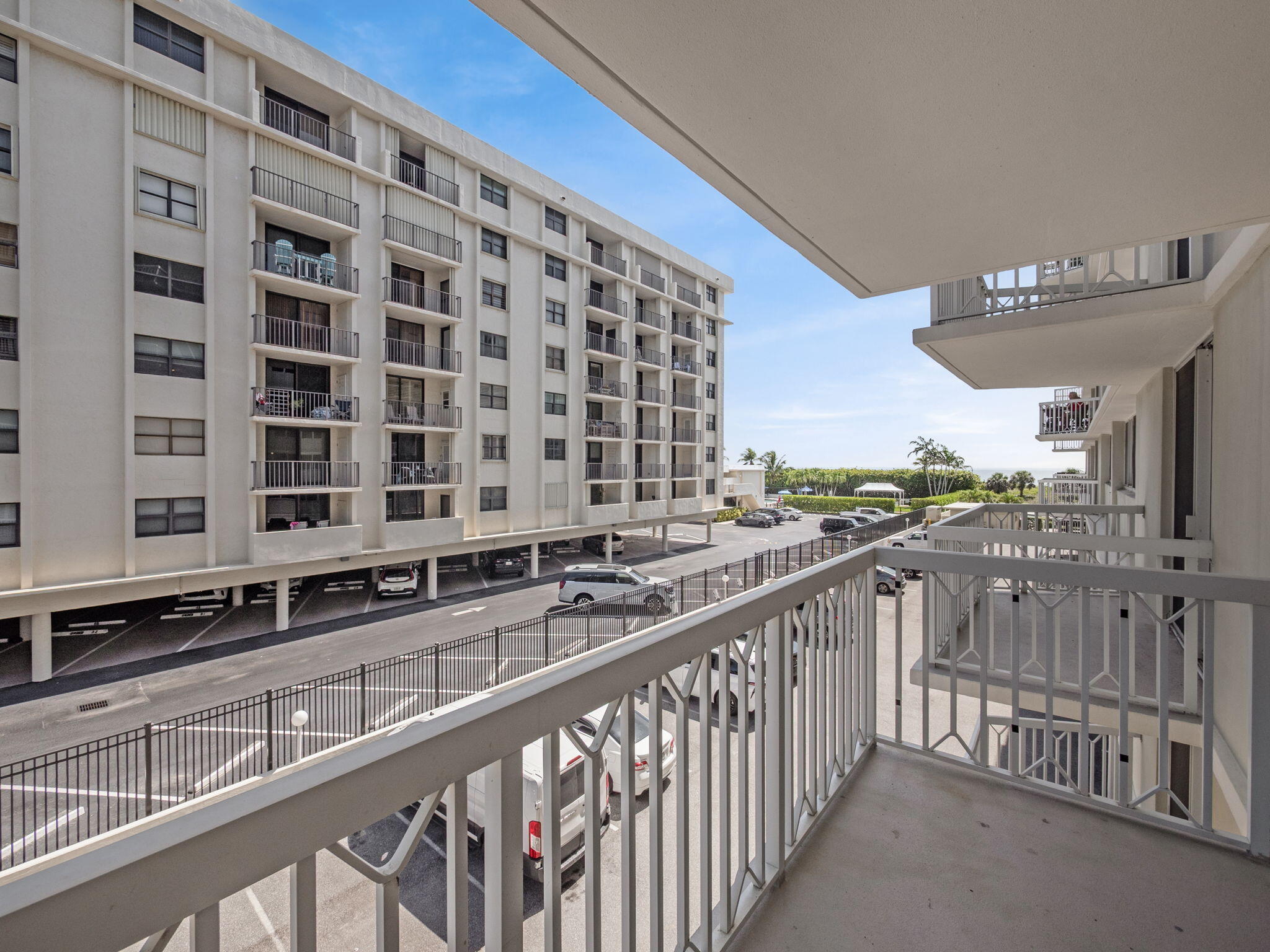 125 South Ocean Avenue, Unit 303 Palm Beach Shores, FL 33404 - Photo 16 of 20 a view of a building from a balcony