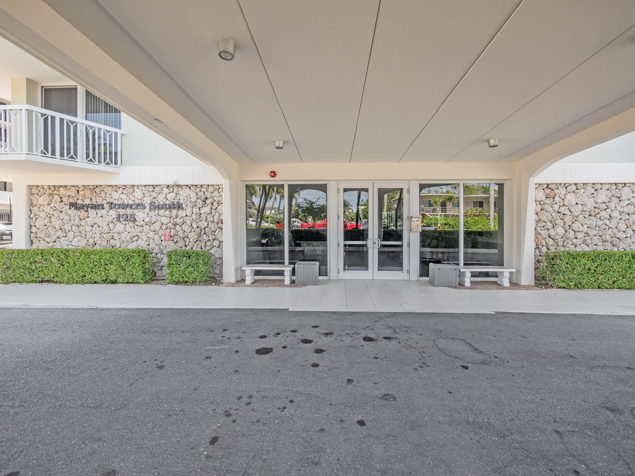 125 South Ocean Avenue, Unit 303 Palm Beach Shores, FL 33404 - Photo 3 of 20 a view of a house with a porch