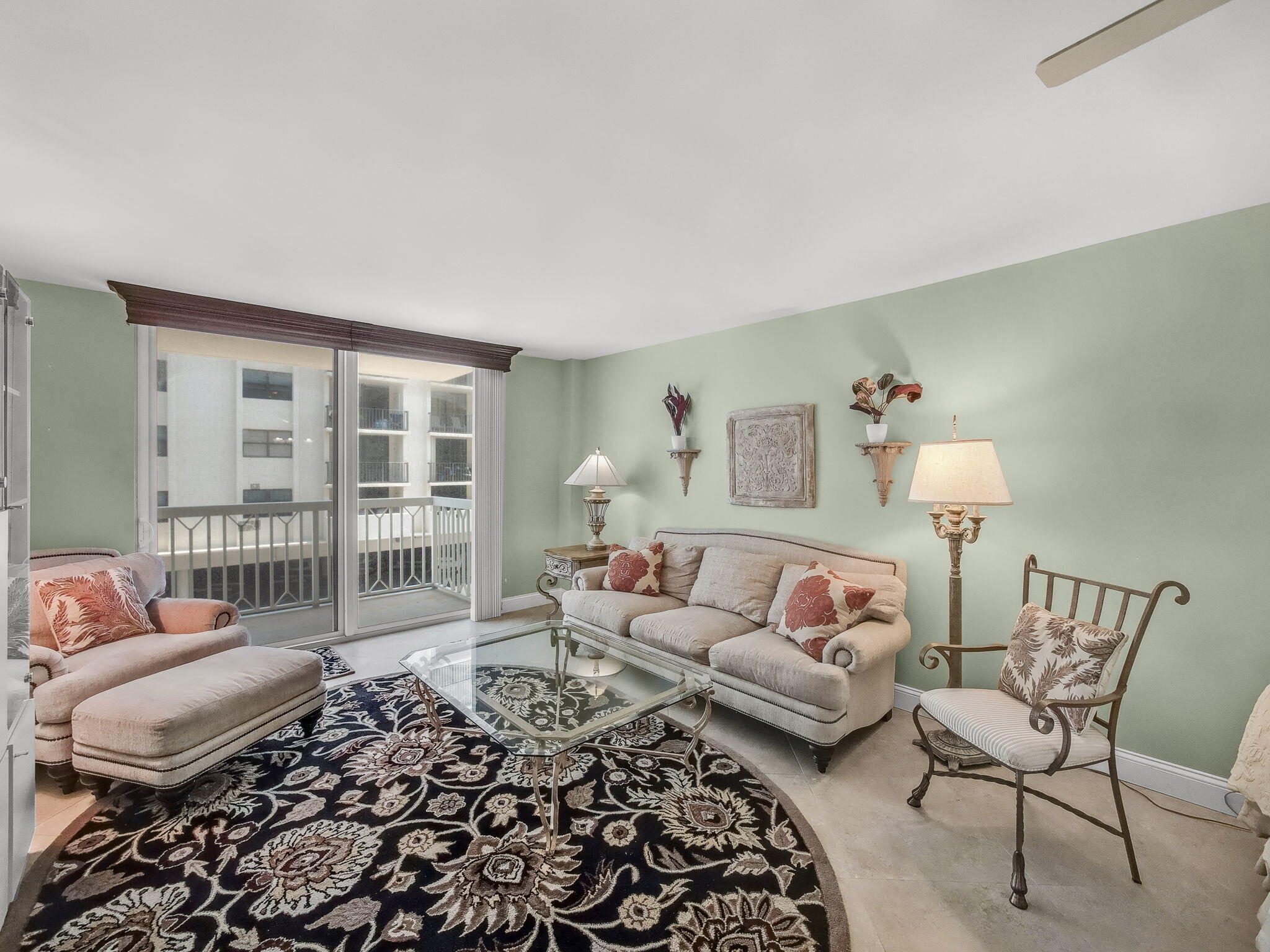 125 South Ocean Avenue, Unit 303 Palm Beach Shores, FL 33404 - Photo 5 of 20 a living room with furniture and a window