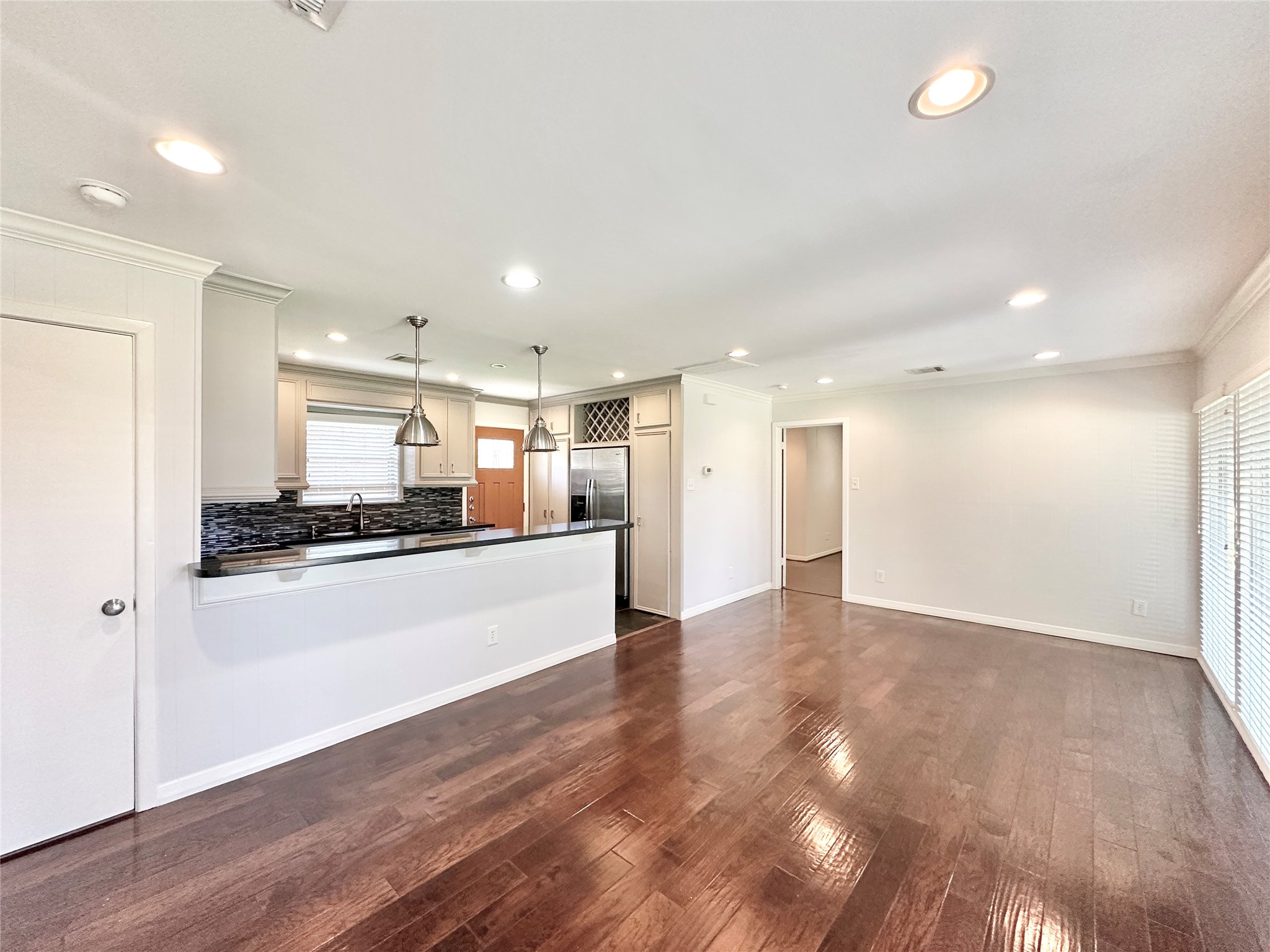 22 Champions Colony West Houston, TX 77069 - Photo 7 of 14 a view of kitchen with wooden floor