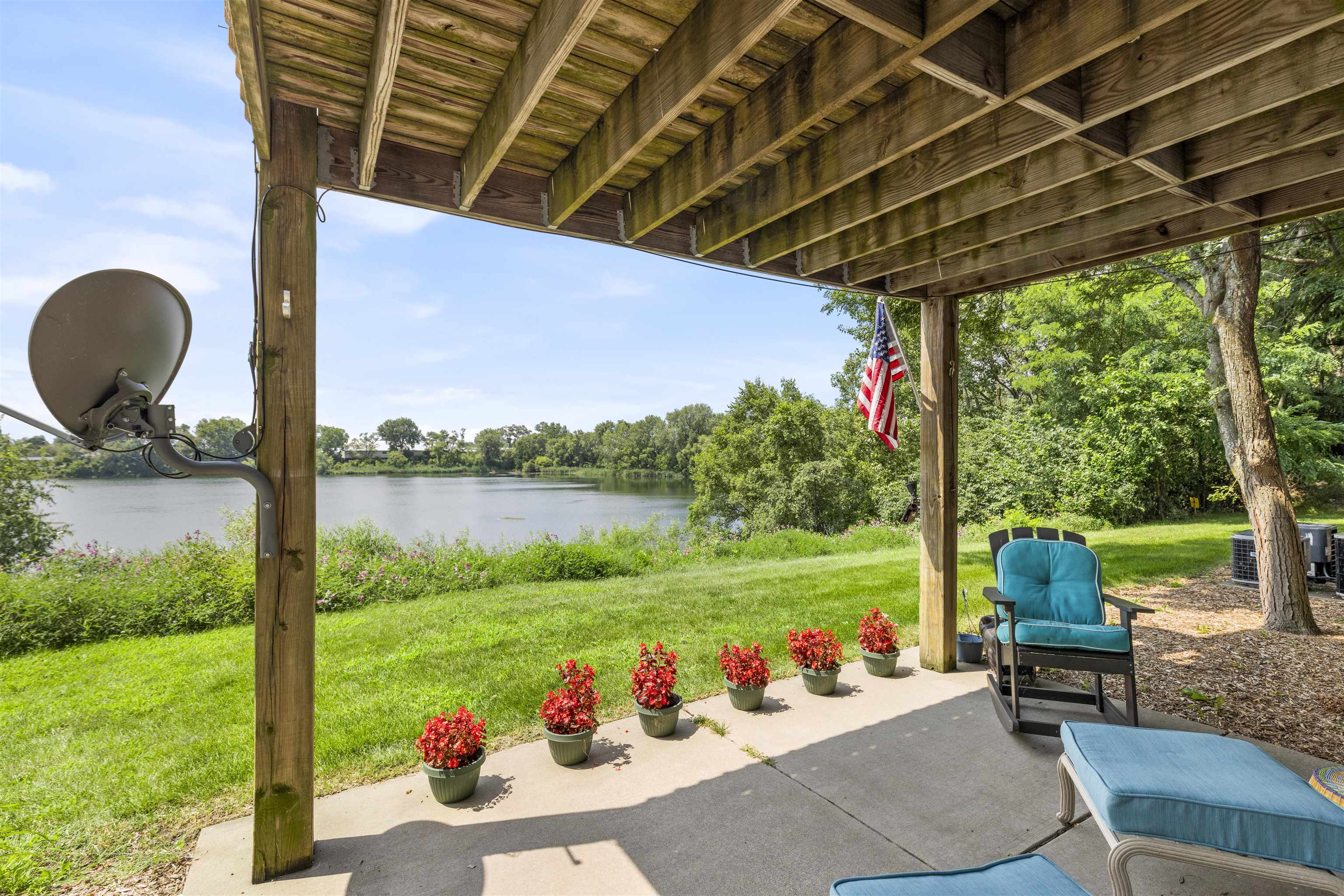 7280 North Alpine Road, Unit 1 Loves Park, IL 61111 - Photo 11 of 14 a backyard of a house with seating space