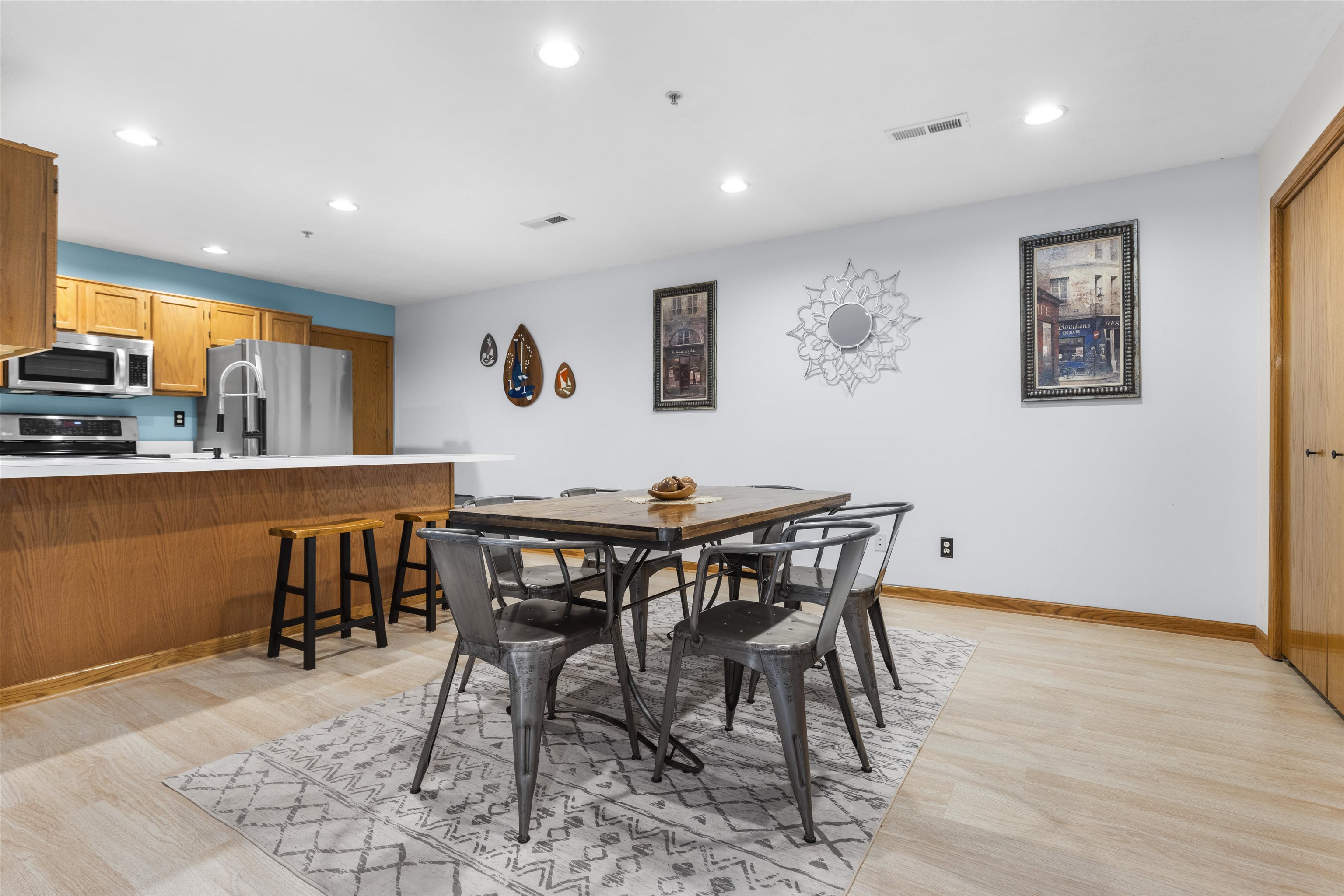 7280 North Alpine Road, Unit 1 Loves Park, IL 61111 - Photo 3 of 14 a view of a dining area with furniture