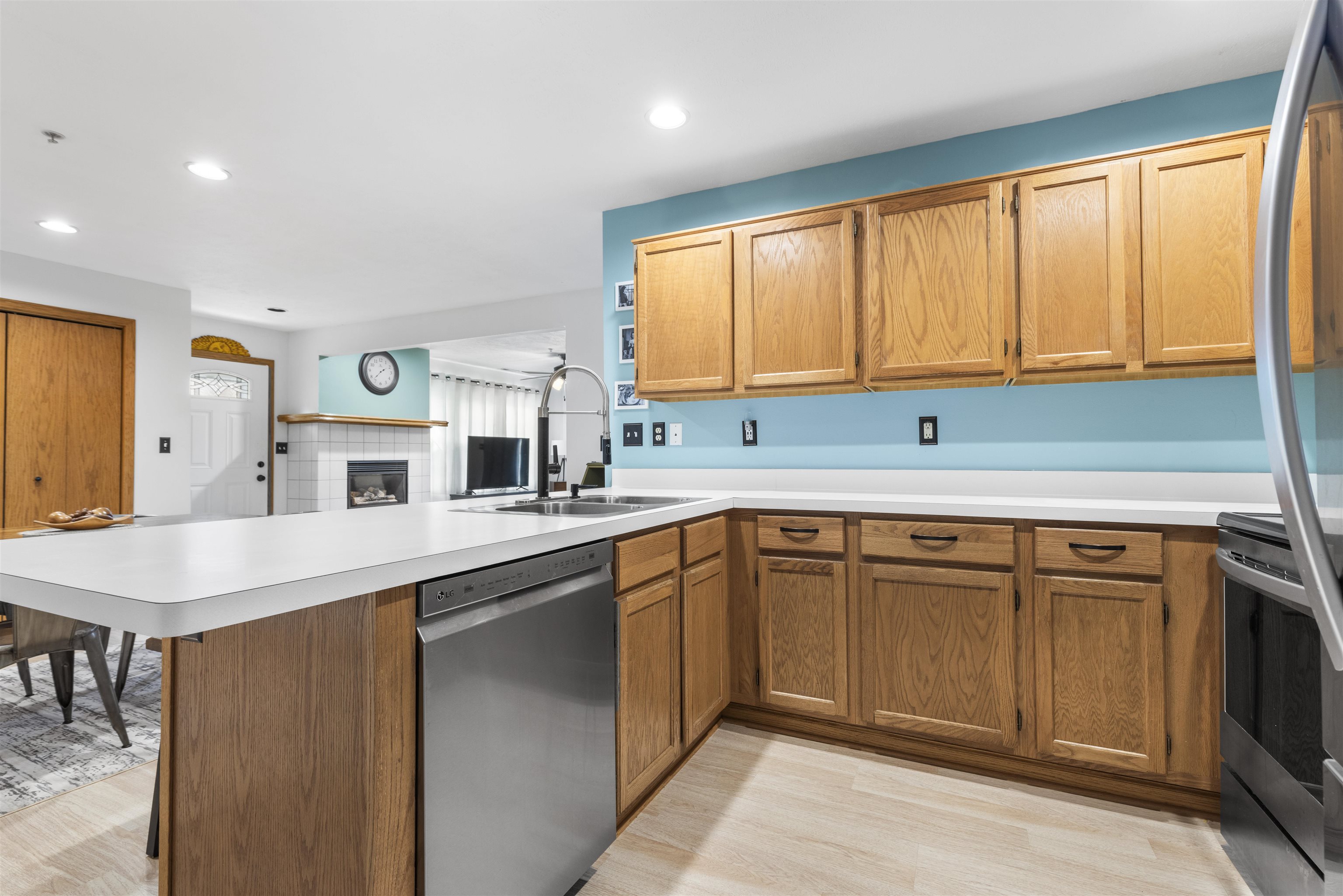 7280 North Alpine Road, Unit 1 Loves Park, IL 61111 - Photo 7 of 14 a kitchen with stainless steel appliances granite countertop a sink and cabinets