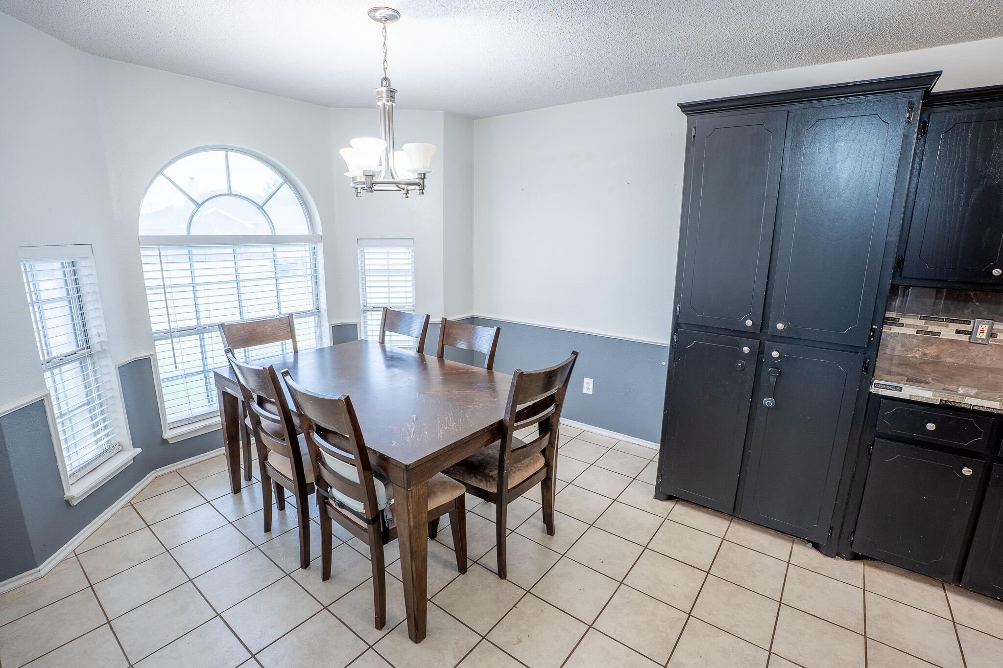 1609 78th Street Lubbock, TX 79423 - Photo 10 of 36 a view of a dining room with furniture