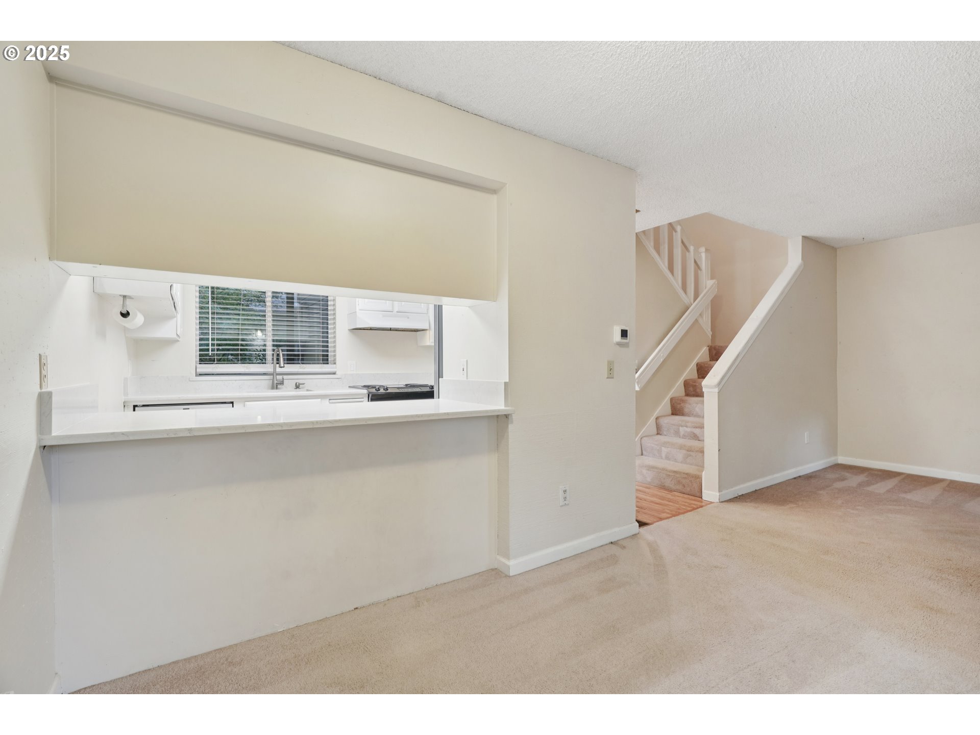 14678 Southwest 106th Avenue Tigard, OR 97224 - Photo 15 of 41 a view of an empty room with stairs