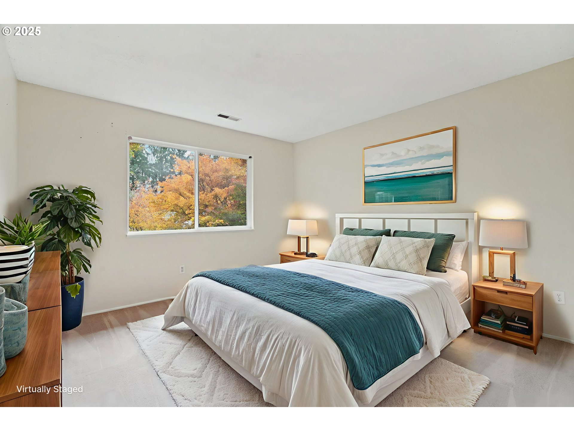 14678 Southwest 106th Avenue Tigard, OR 97224 - Photo 21 of 41 a bedroom with a bed and a painting on the wall