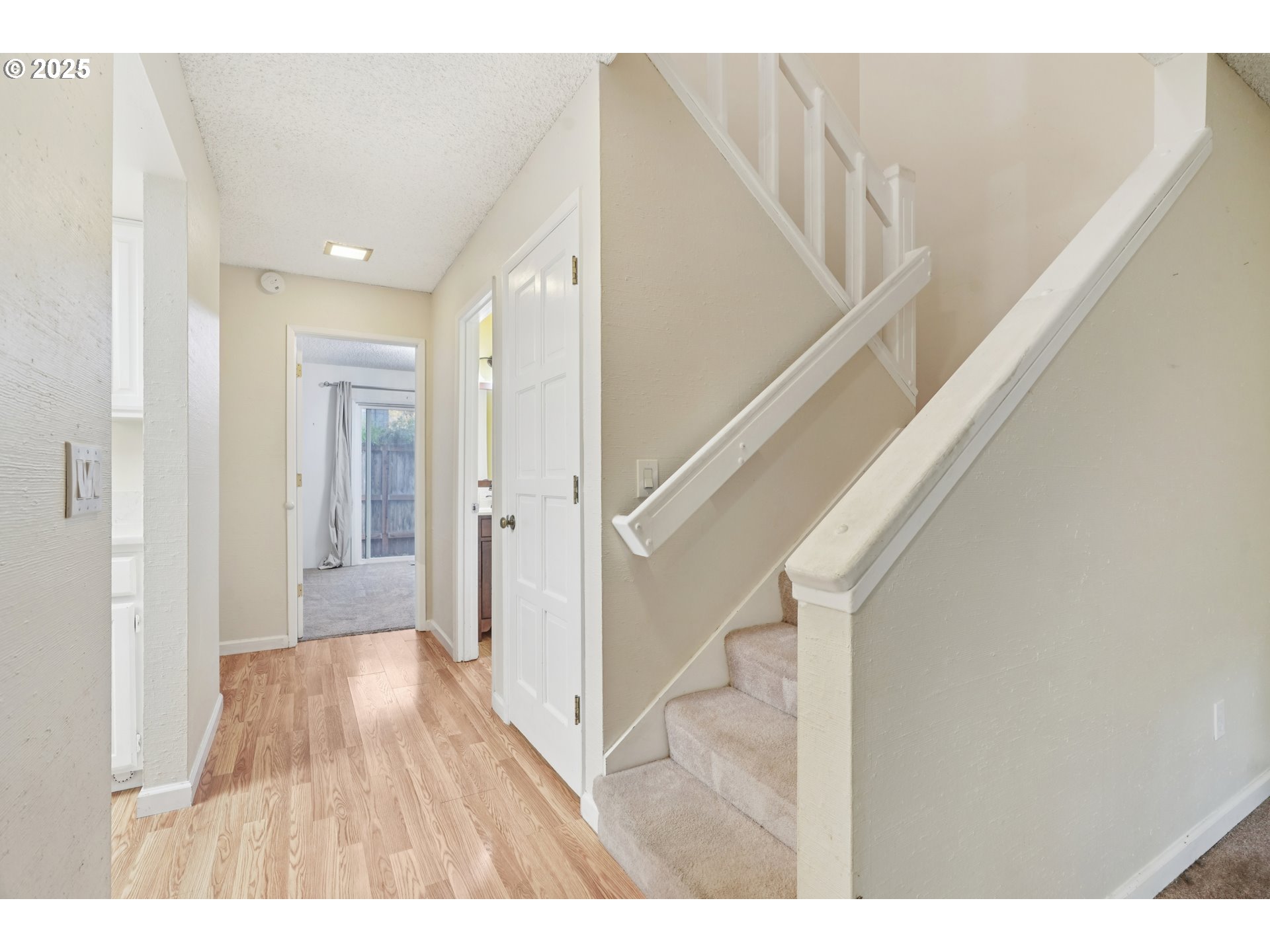 14678 Southwest 106th Avenue Tigard, OR 97224 - Photo 35 of 41 a view of hallway with wooden floor