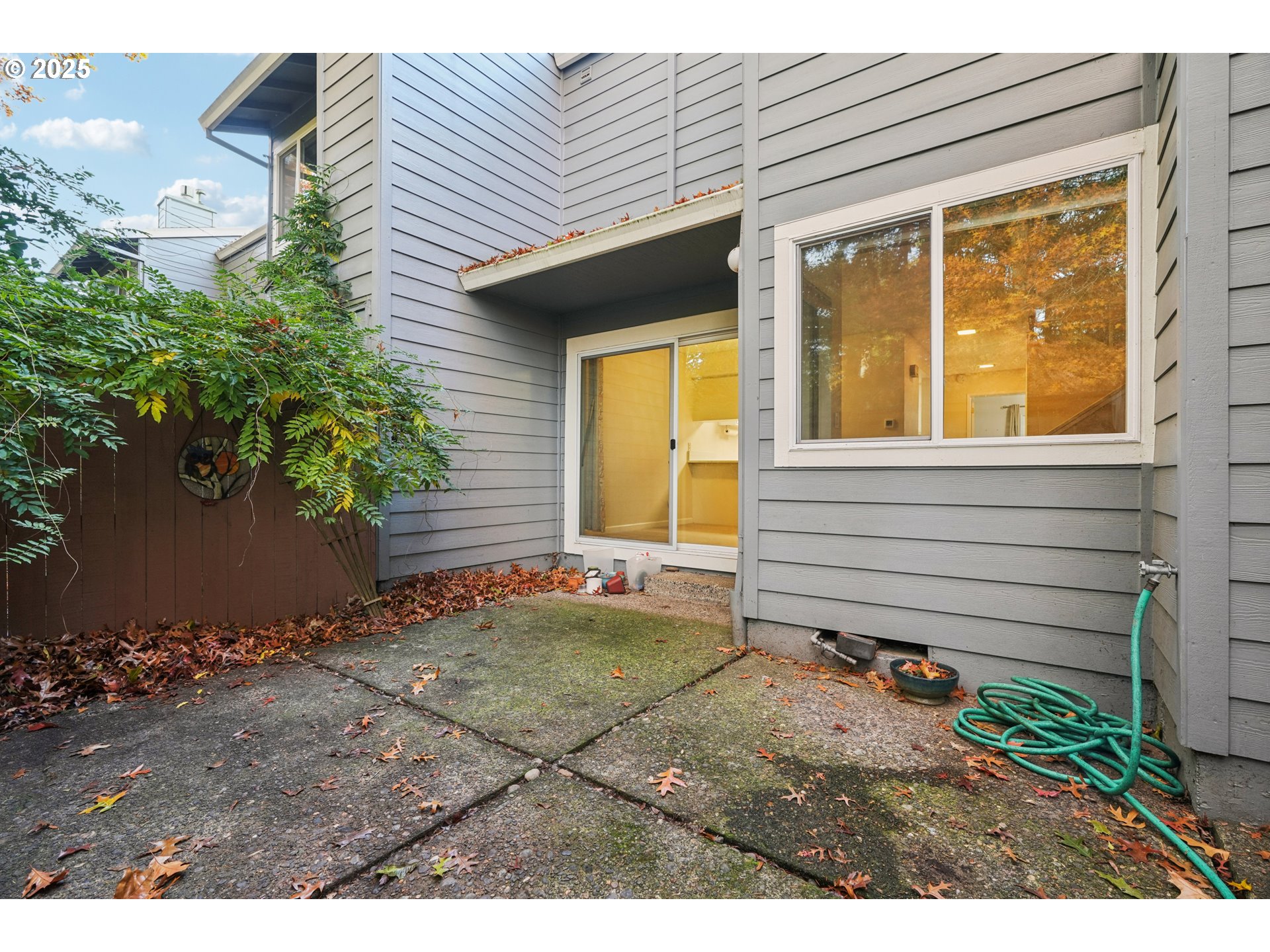 14678 Southwest 106th Avenue Tigard, OR 97224 - Photo 40 of 41 a view of house with backyard and garden