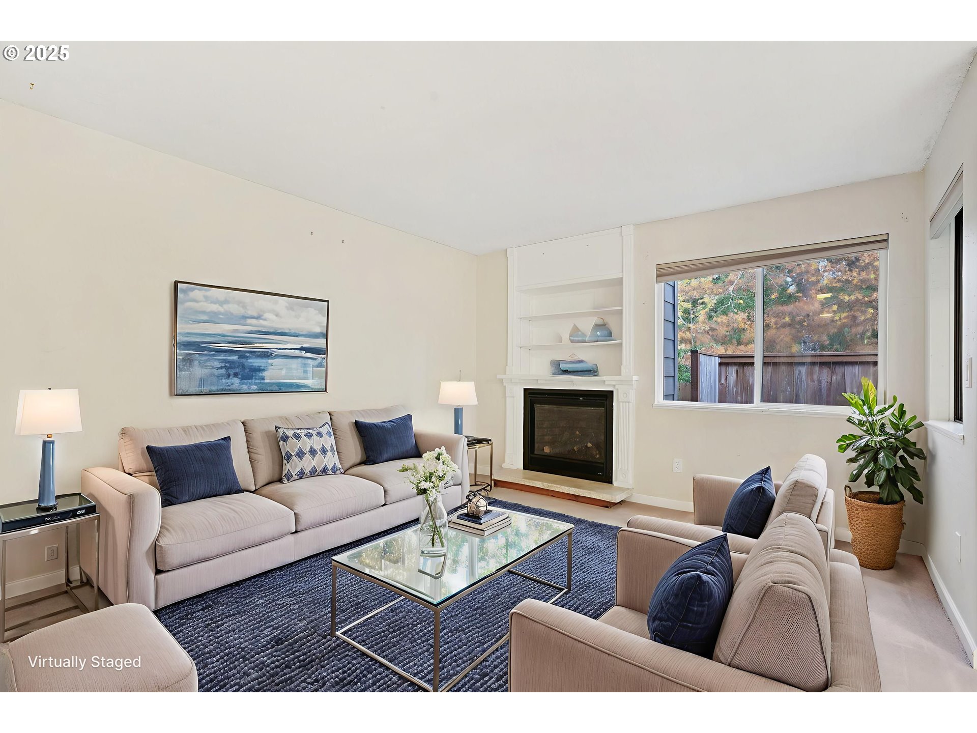 14678 Southwest 106th Avenue Tigard, OR 97224 - Photo 10 of 41 a living room with furniture or couch and a fireplace