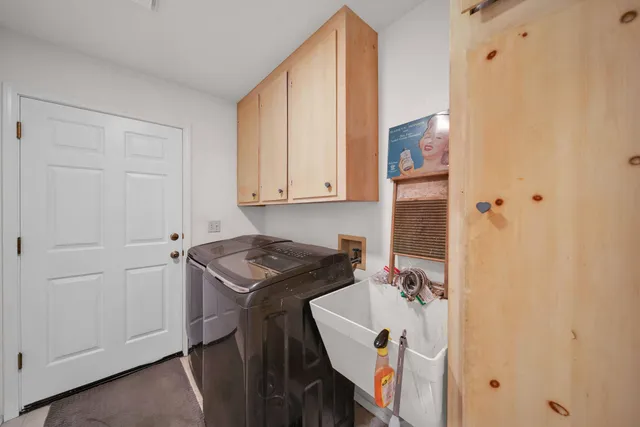 a view of backyard with swimming pool and outdoor seating