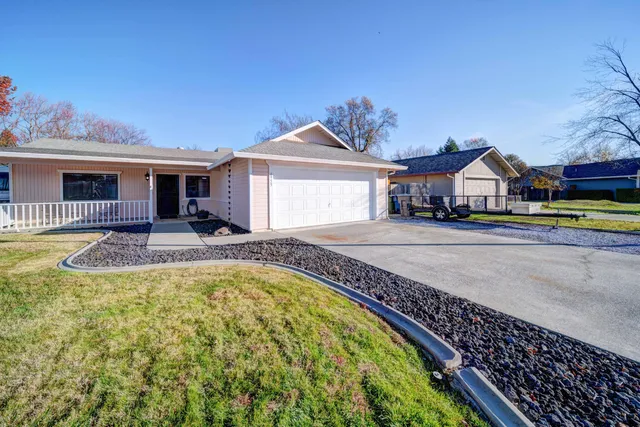 a front view of a house with swimming pool