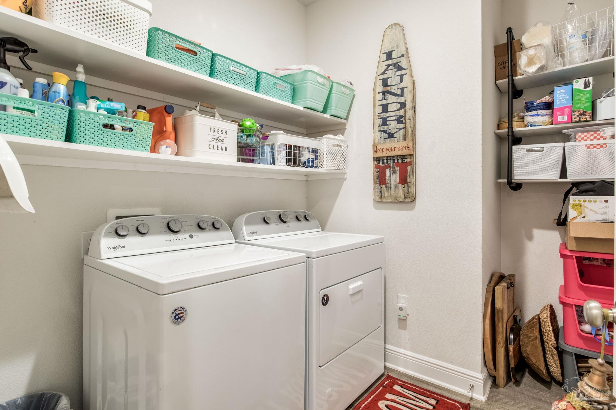 7990 Burnside Loop Pensacola, FL 32526 - Photo 20 of 61 a utility room with dryer and washer