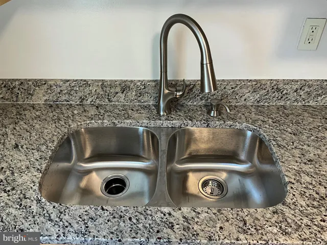 a close view of sink and mirror