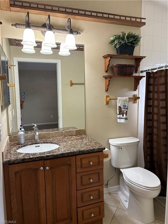 5232 Raintree Lane Naples, FL 34113 - Photo 6 of 38 MASTER BATH GRANITE TOP , NEW KOLHER TOILET