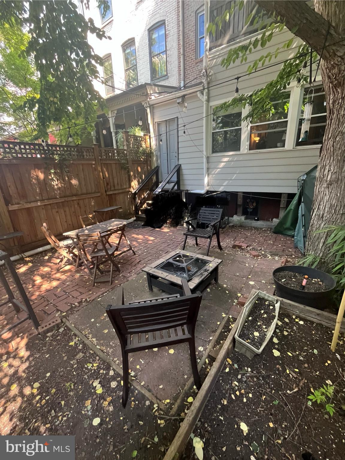515 Constitution Avenue Northeast Washington, DC 20002 - Photo 10 of 13 Patio space sheltered by tree