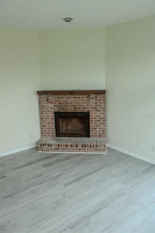 a view of a two chairs in the balcony