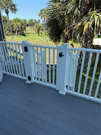 a bathroom with a white wall and a window