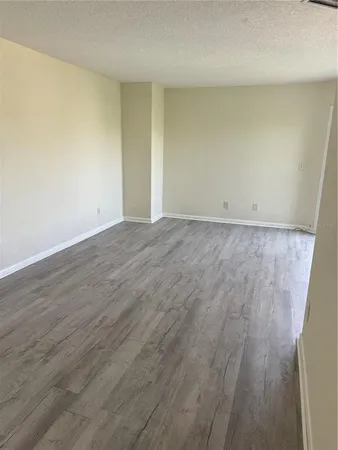 a view of a balcony with furniture