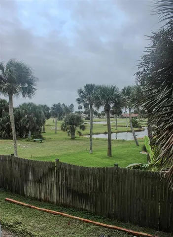 a view of a lake with outdoor space