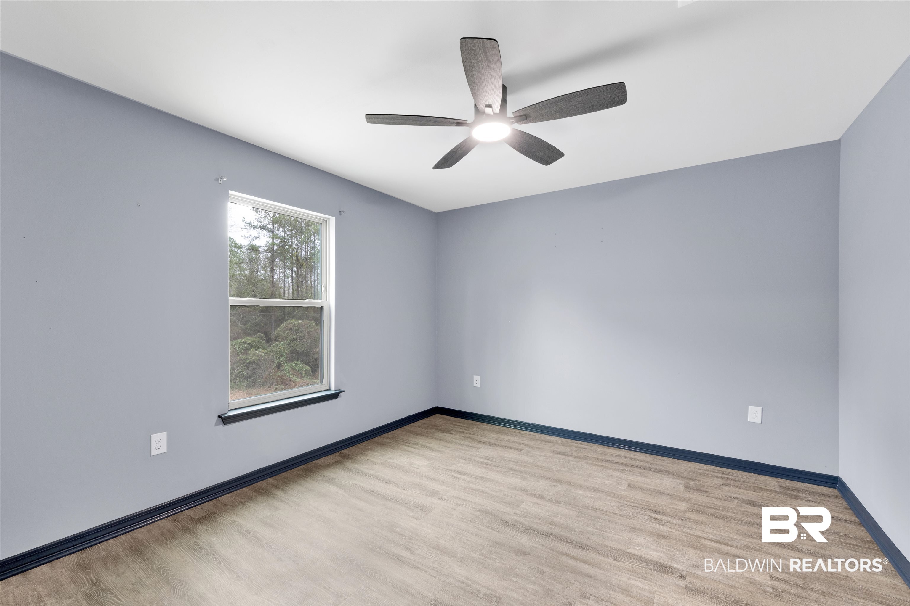 36397 Alexandria Trail Stapleton, AL 36578 - Photo 47 of 65 Spare room with light wood finished floors and a ceiling fan