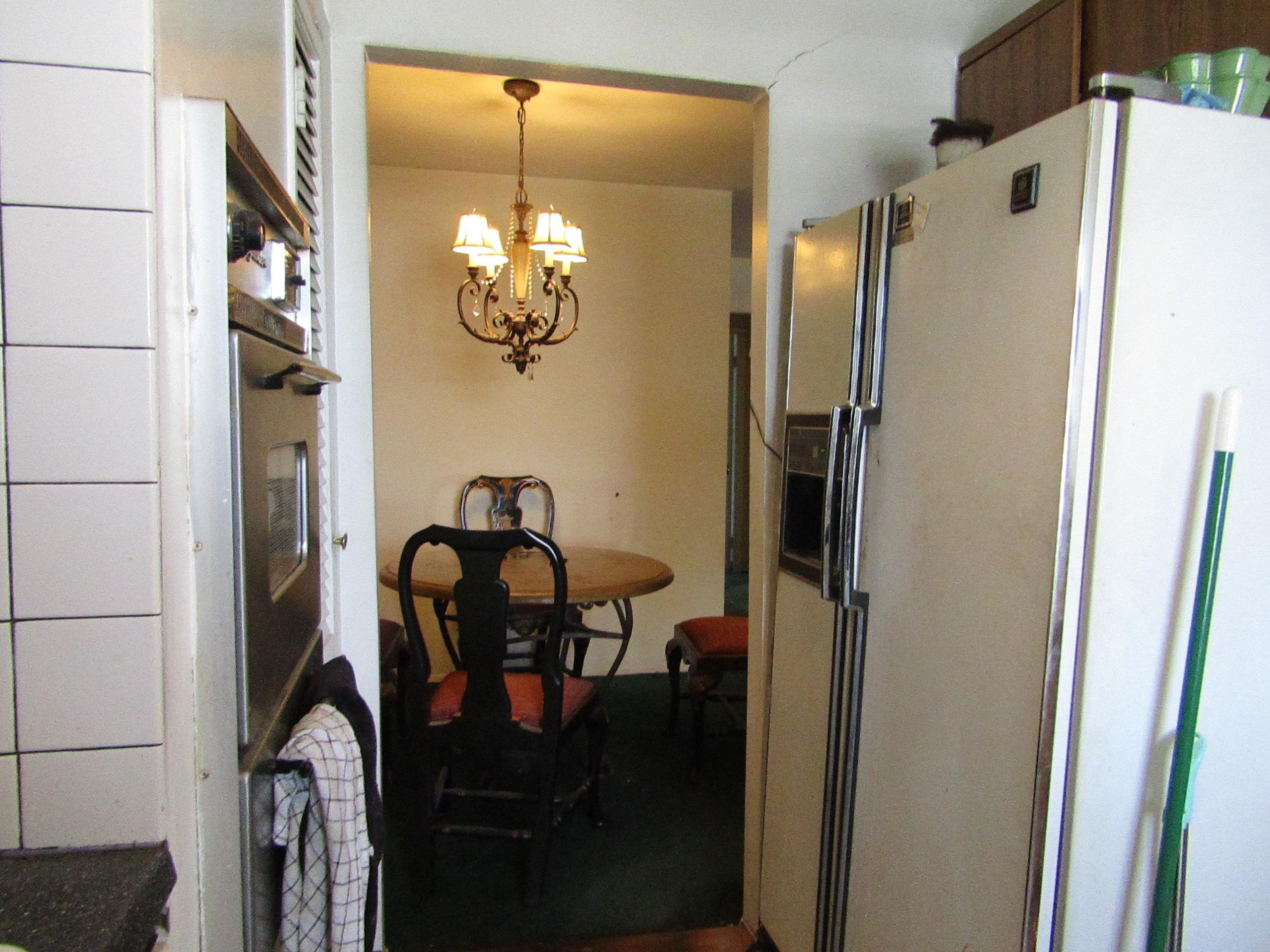 31 Exeter Road Jersey City, NJ 07305 - Photo 12 of 39 a dining room with furniture and chandelier