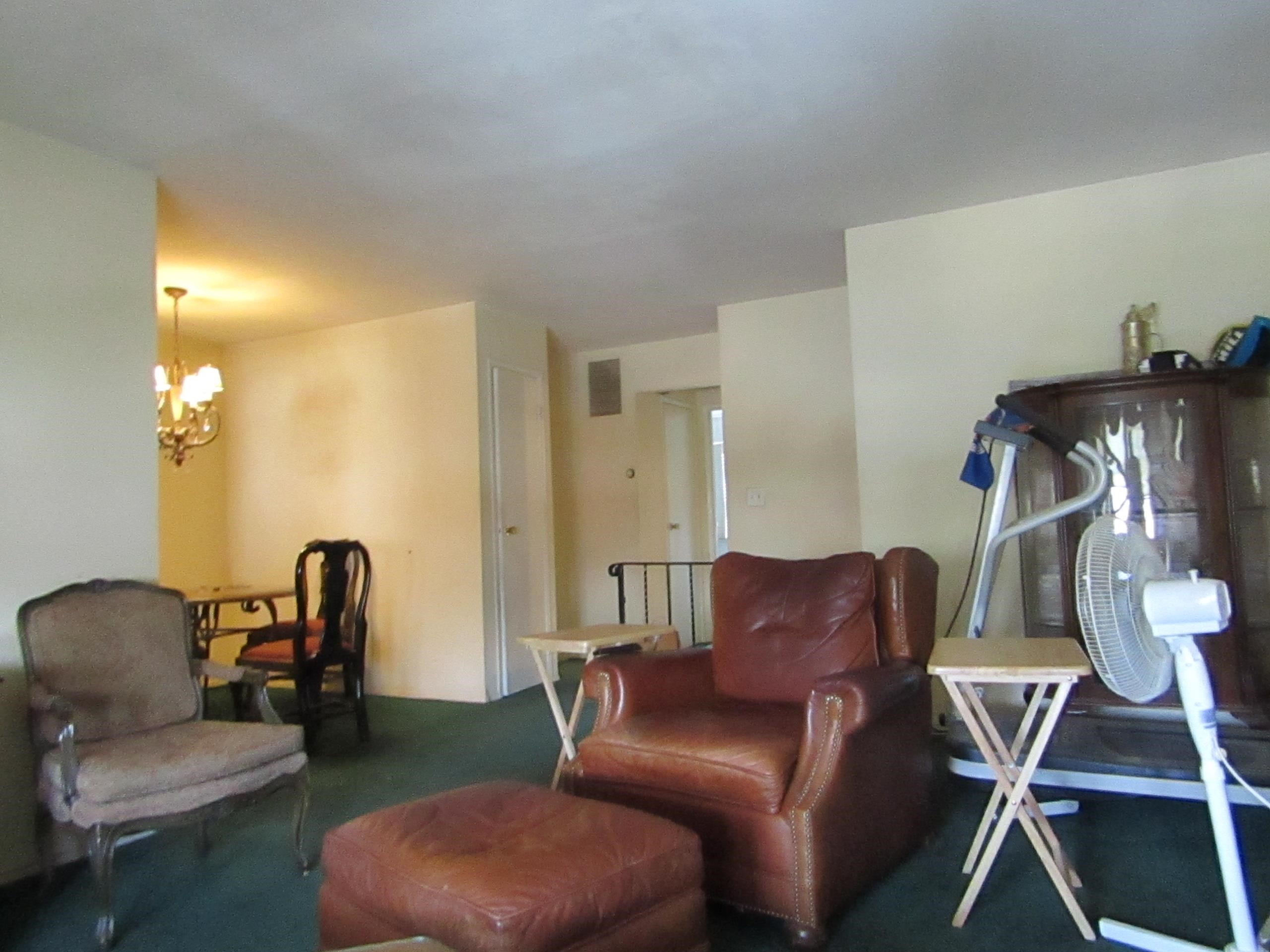 31 Exeter Road Jersey City, NJ 07305 - Photo 16 of 39 a living room with furniture and a gym equipment