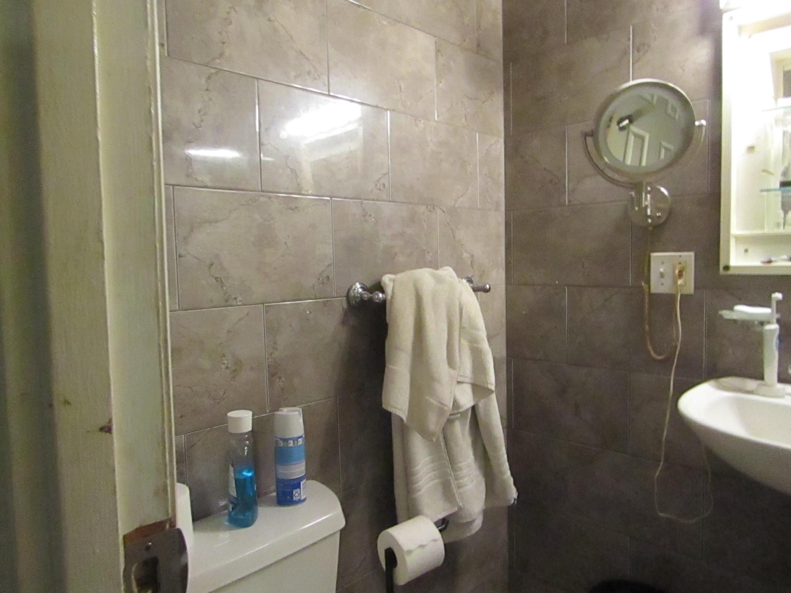 31 Exeter Road Jersey City, NJ 07305 - Photo 3 of 39 a bathroom with a shower