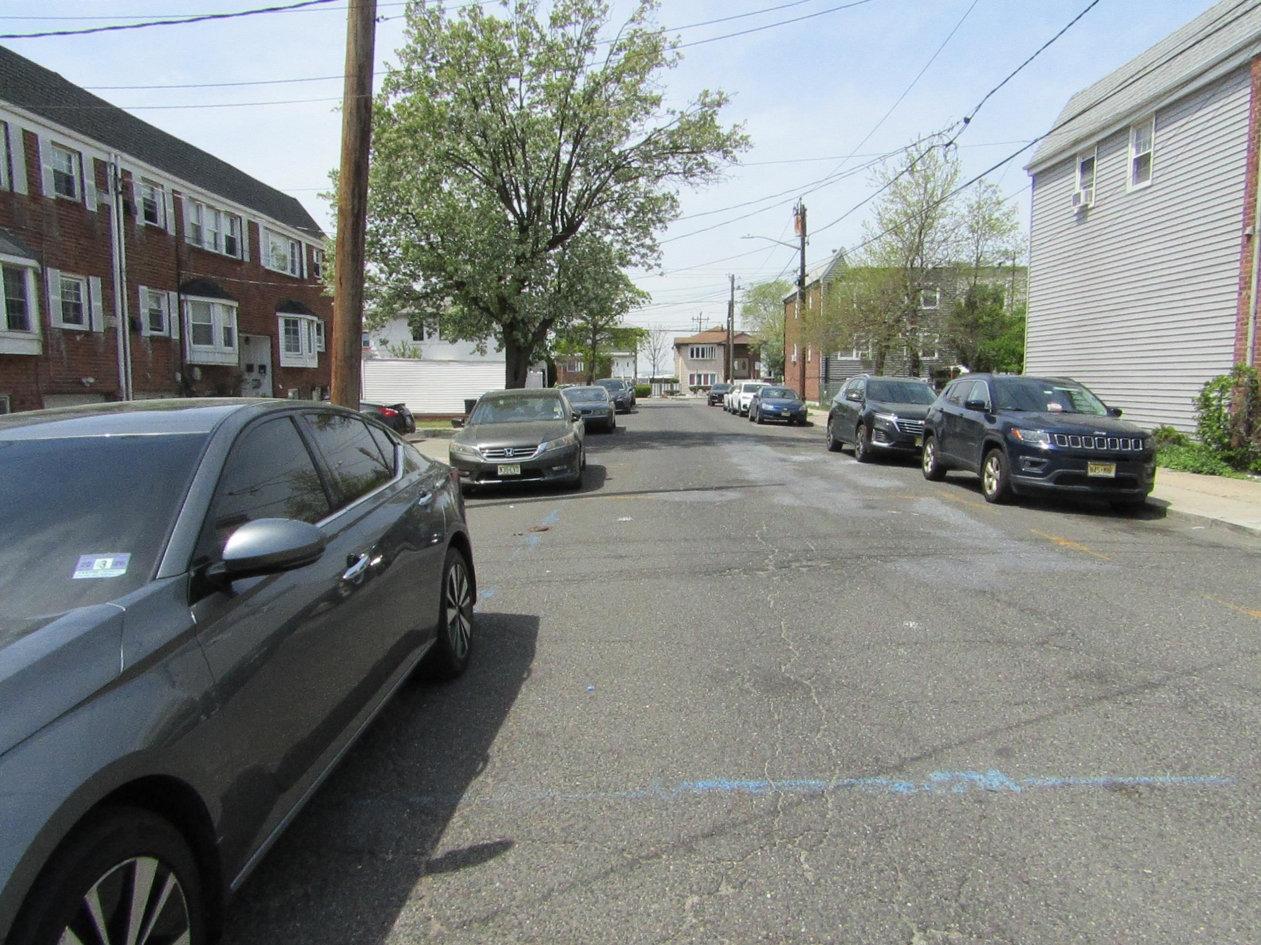 31 Exeter Road Jersey City, NJ 07305 - Photo 38 of 39 a view of a cars park in front of a building