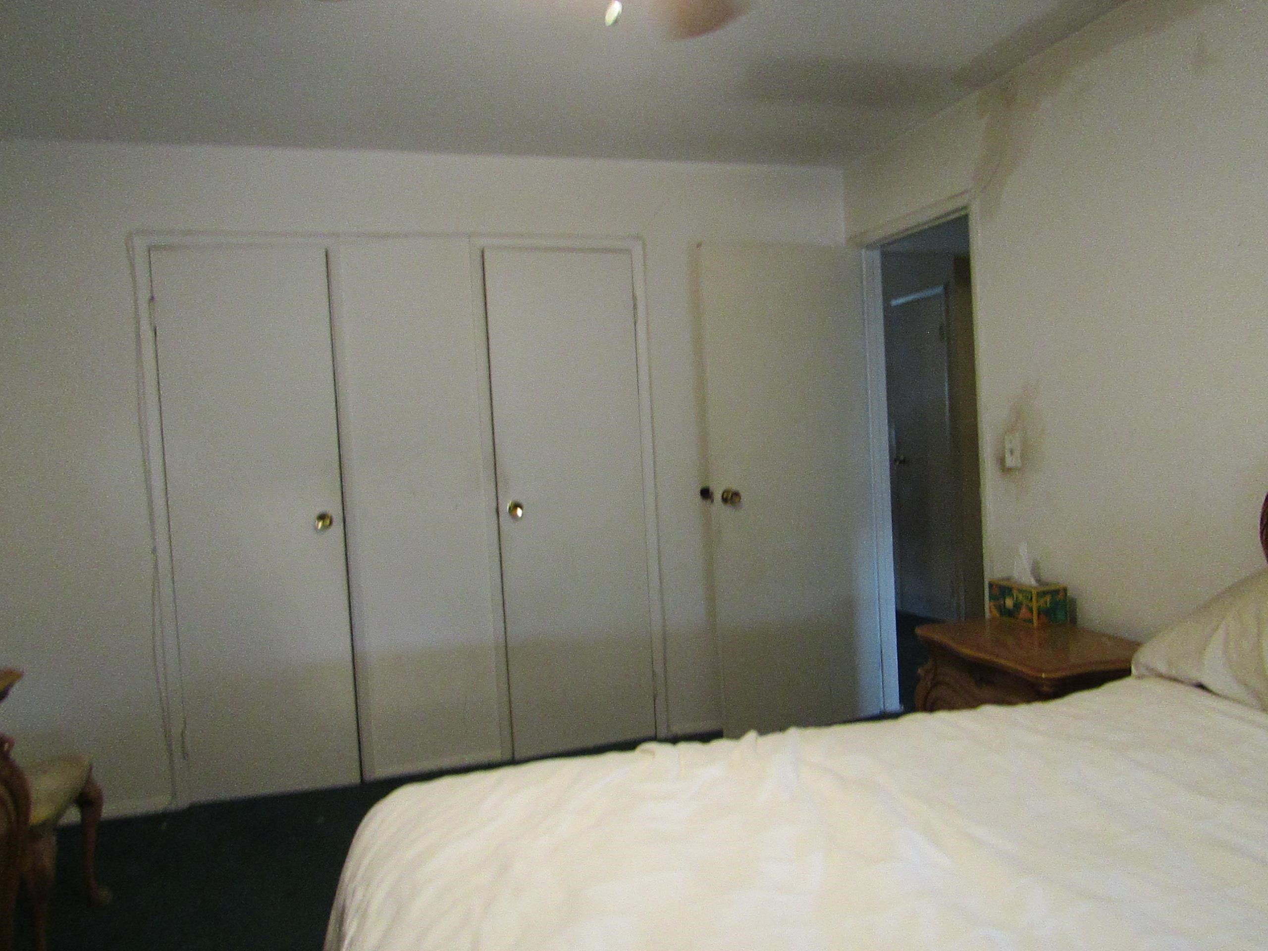 31 Exeter Road Jersey City, NJ 07305 - Photo 8 of 39 a bedroom with a bed and a closet