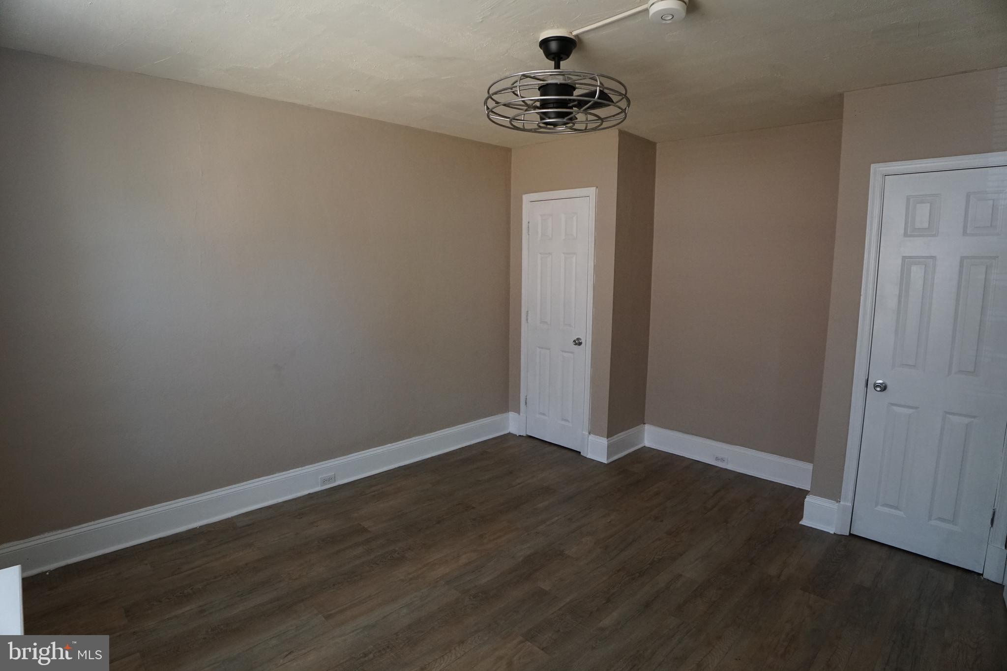 2 Aigburth Road, Unit 1 Towson, MD 21286 - Photo 8 of 10 a view of an empty room and wooden floor