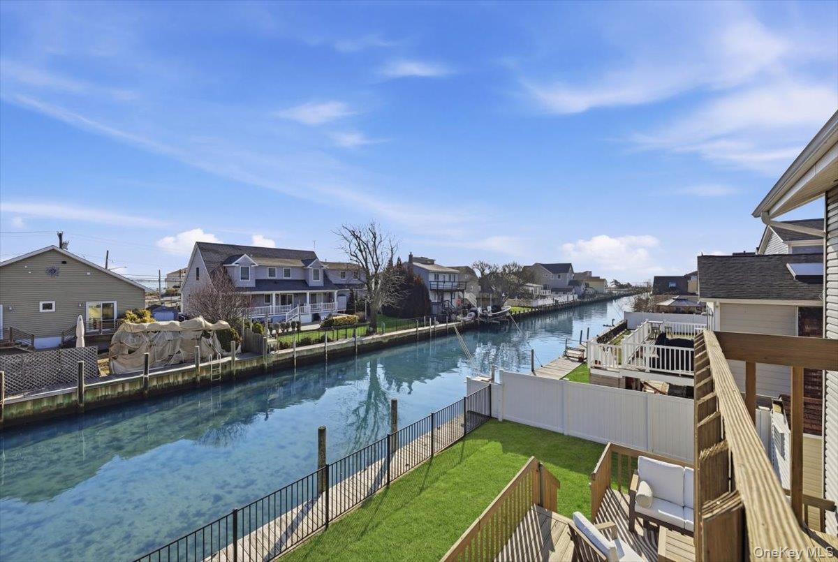 141 Annuskemunnica Road Babylon, NY 11702 - Photo 23 of 44 a view of a city from a balcony