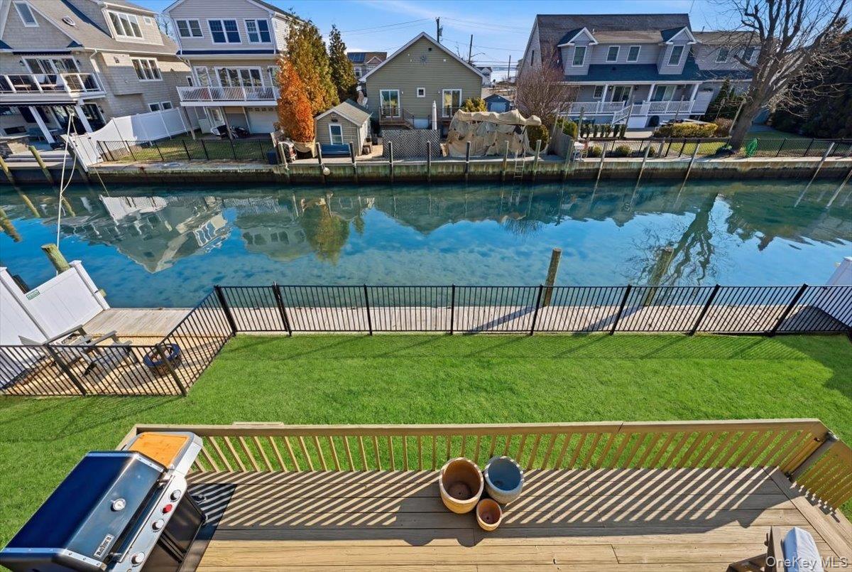 141 Annuskemunnica Road Babylon, NY 11702 - Photo 33 of 44 a view of swimming pool and lake view