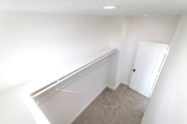 a view of storage utility room with a window