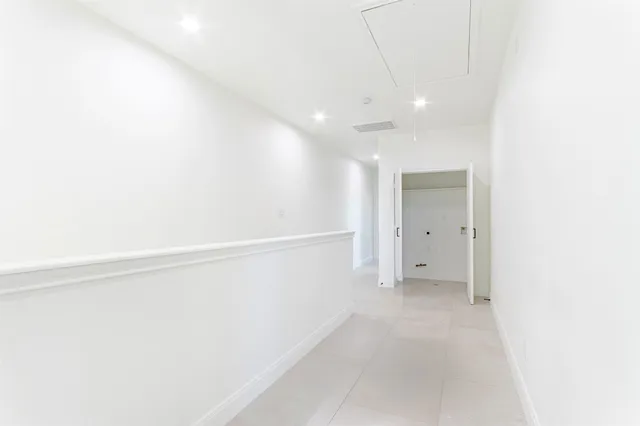 a view of living room kitchen