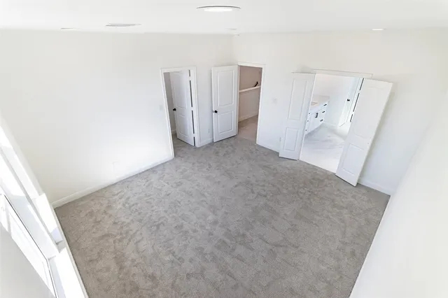 a kitchen with a sink and refrigerator