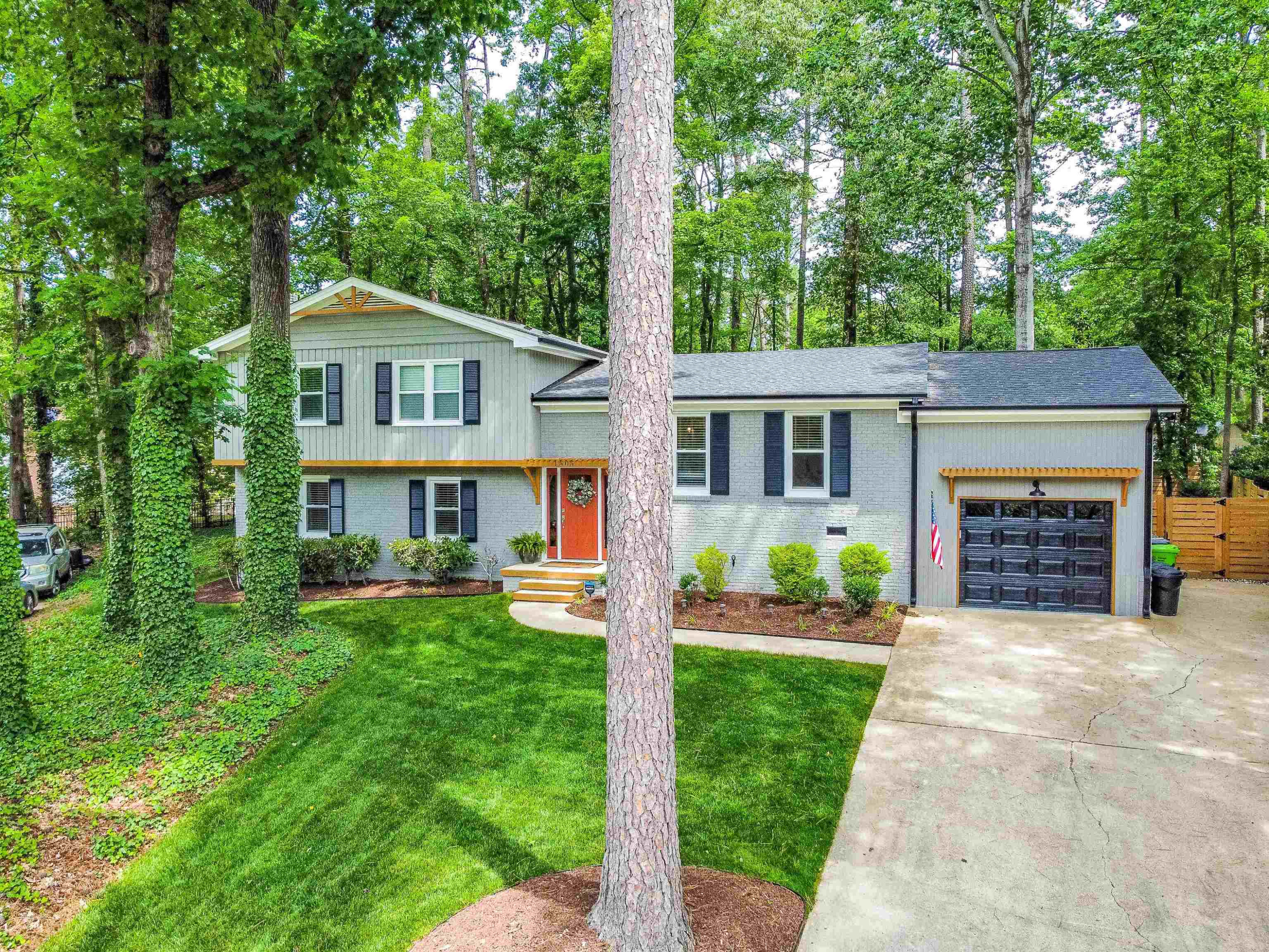 front view of a house with a yard