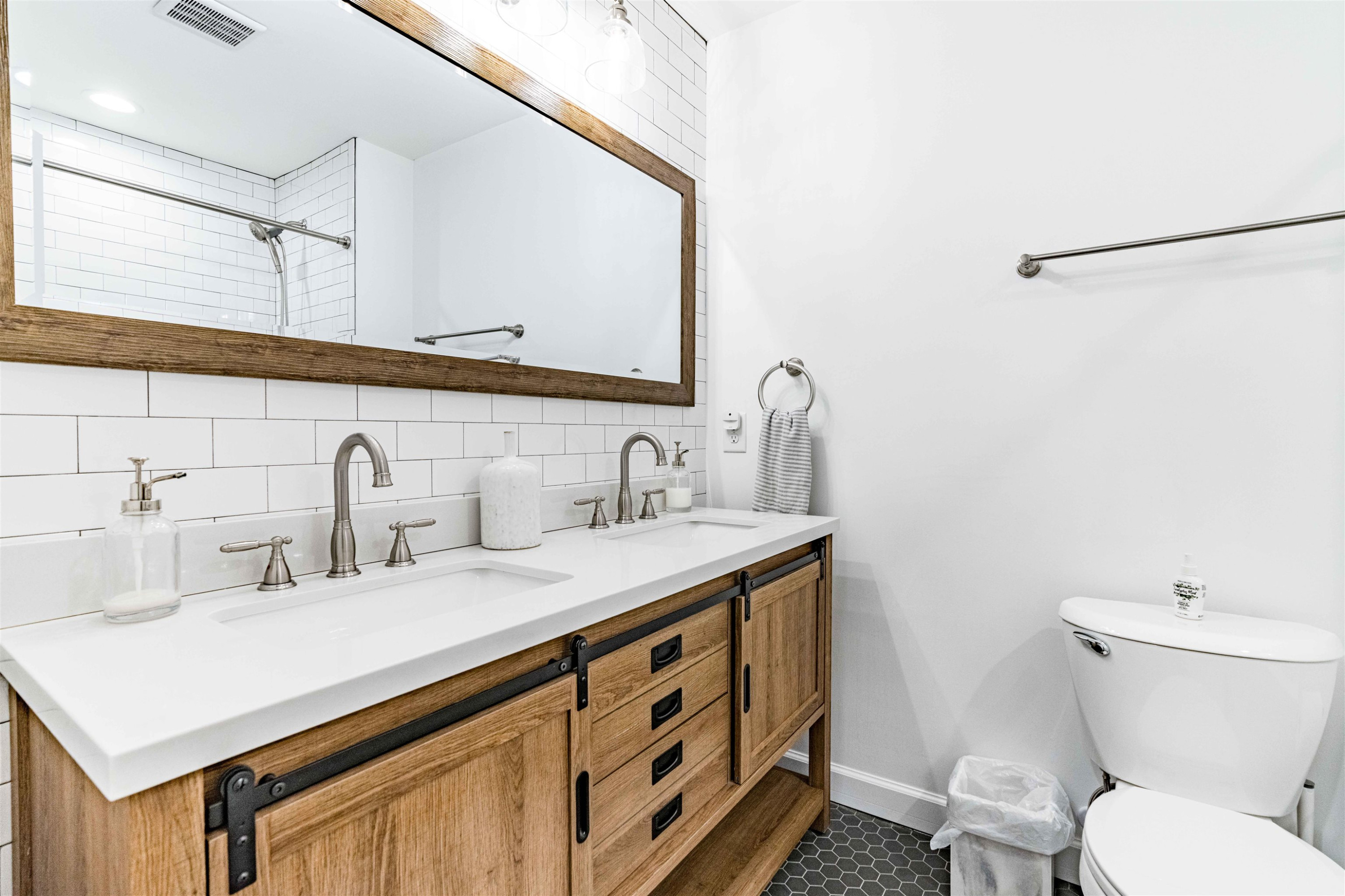 1505 Windbur Place Raleigh, NC 27609 - Photo 26 of 44 a bathroom with a sink and a toilet