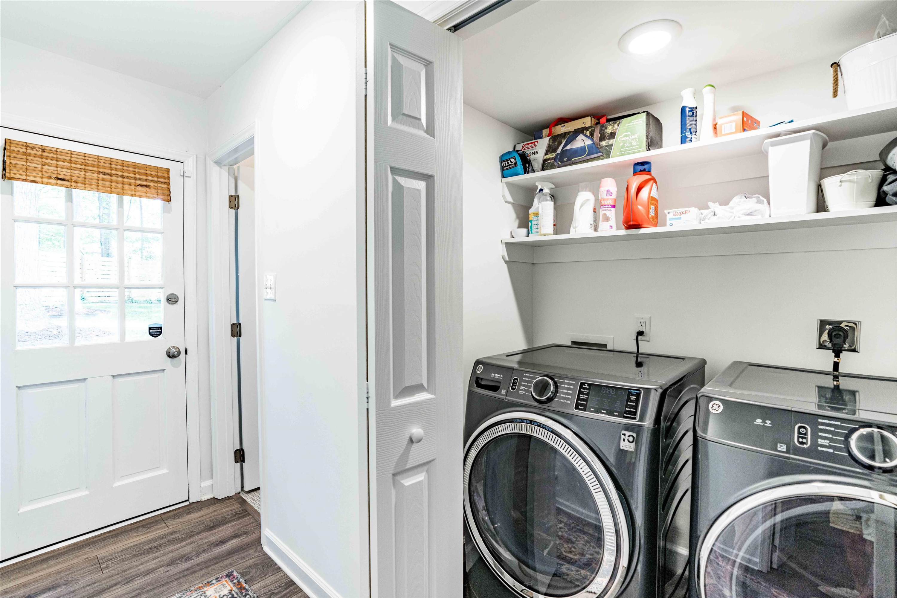 1505 Windbur Place Raleigh, NC 27609 - Photo 36 of 44 a view of storage and utility room with washer and dryer