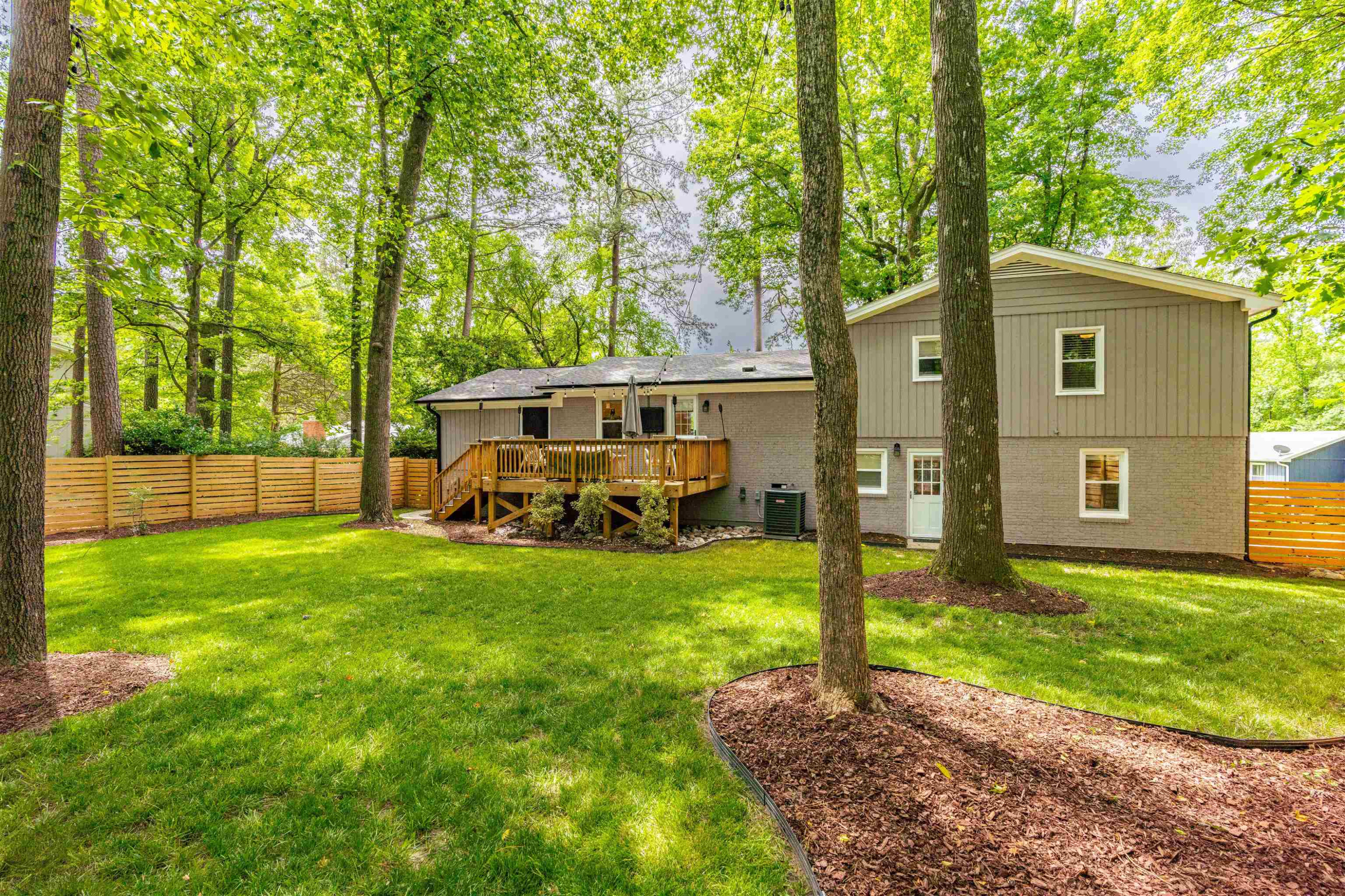 1505 Windbur Place Raleigh, NC 27609 - Photo 43 of 44 a view of a house with backyard and sitting area