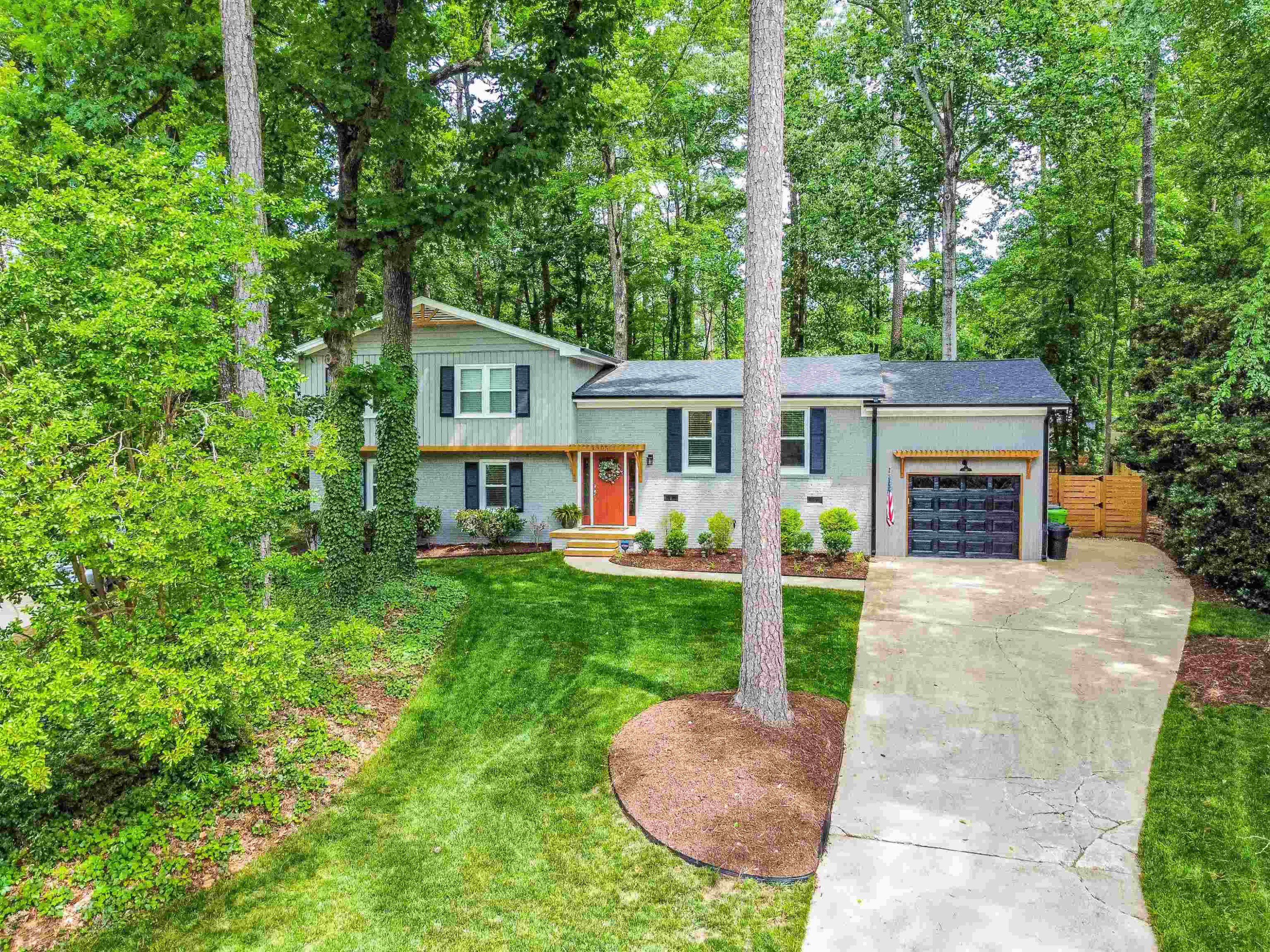 1505 Windbur Place Raleigh, NC 27609 - Photo 5 of 44 front view of a house with a yard