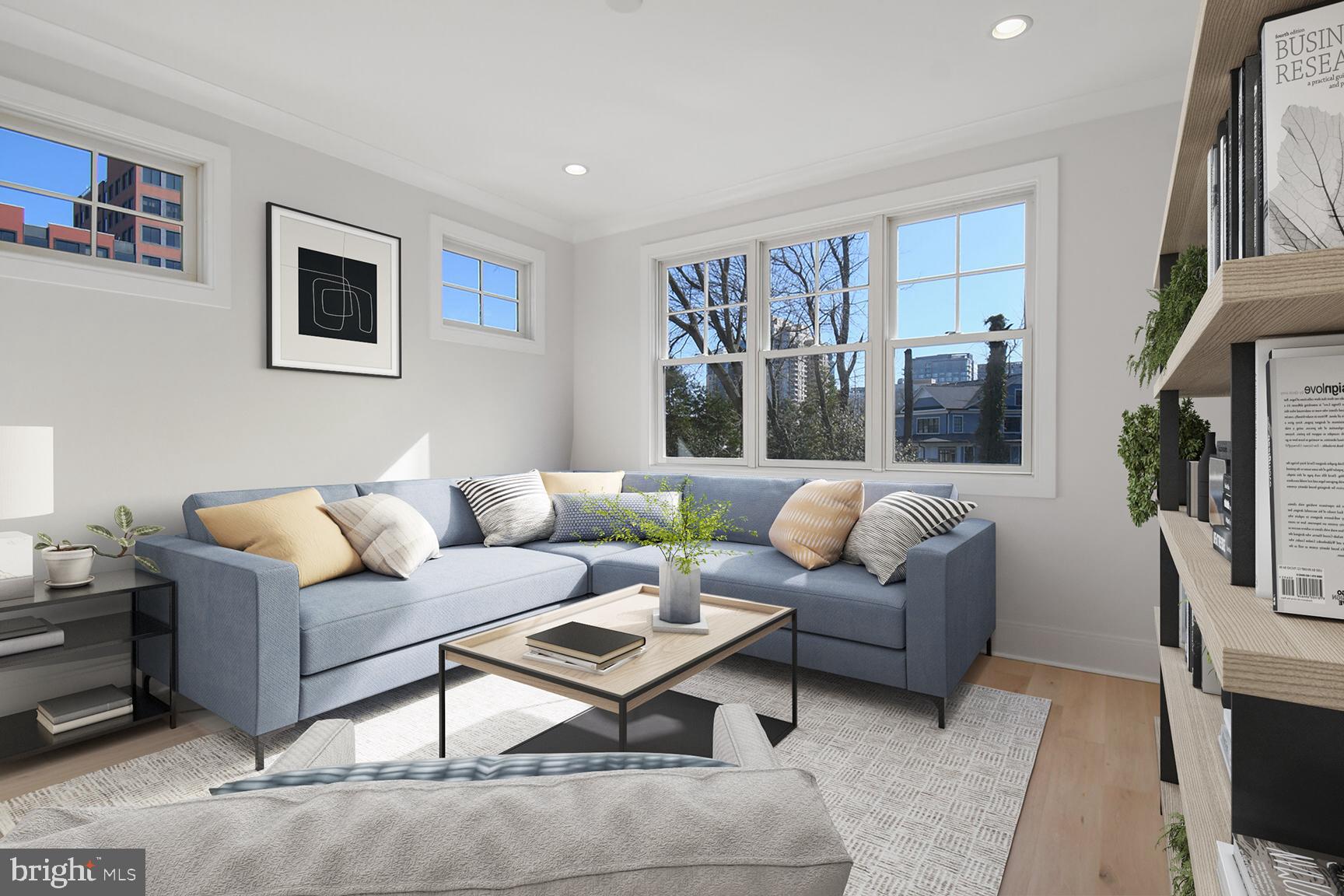 7819 Exeter Road Bethesda, MD 20814 - Photo 19 of 44 a living room with furniture and a flat screen tv