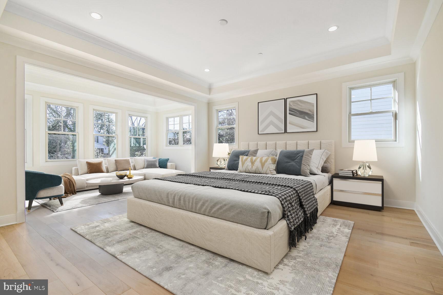 7819 Exeter Road Bethesda, MD 20814 - Photo 21 of 44 a bedroom with a large bed couch and a window