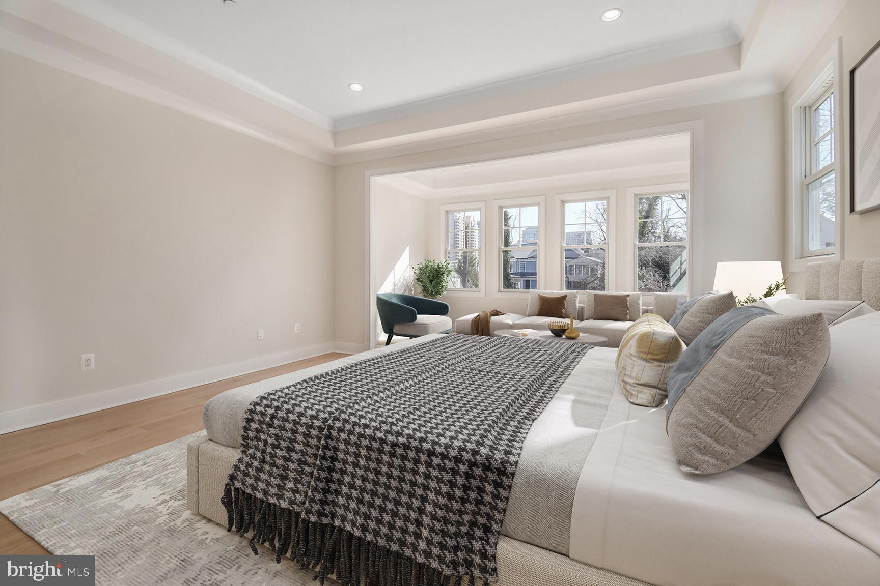 7819 Exeter Road Bethesda, MD 20814 - Photo 22 of 44 a bedroom with bed and a large window