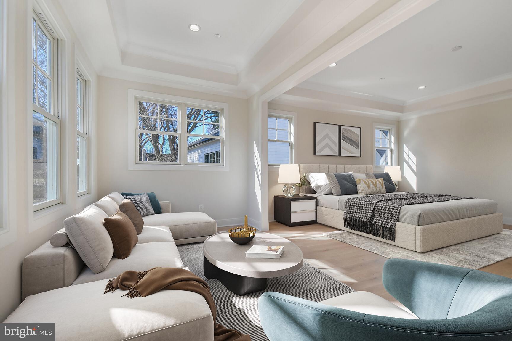 7819 Exeter Road Bethesda, MD 20814 - Photo 23 of 44 a living room with furniture and a large window