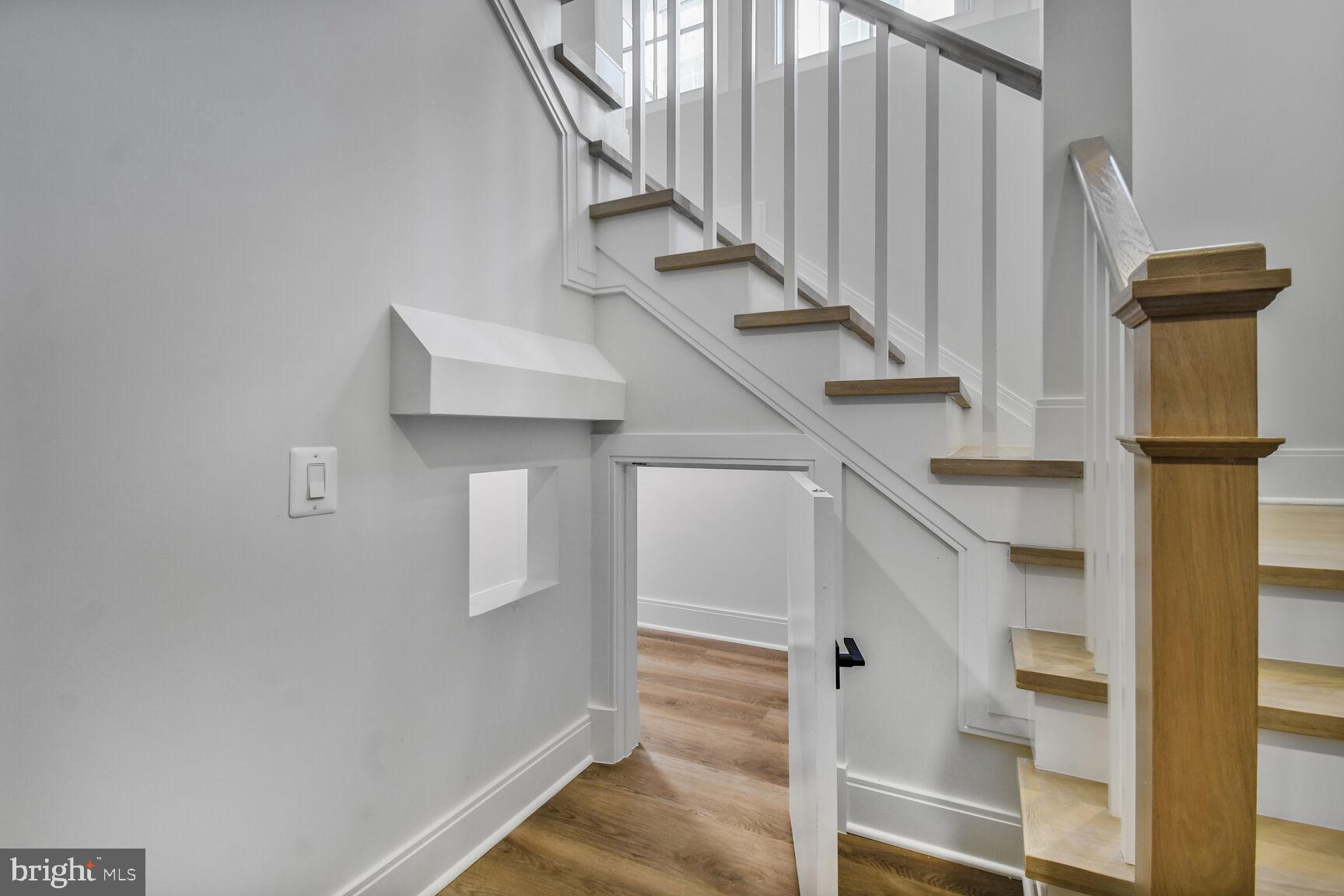 7819 Exeter Road Bethesda, MD 20814 - Photo 36 of 44 a view of entryway and hall with wooden floor